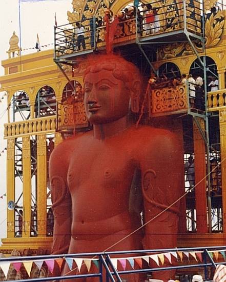 The statue of Bāhubali at Shravana Belgola is drenched in red during the ‘great head-anointing ceremony’ – mahāmastakābhiṣeka – in 2006. The centrepiece of a month-long festival, the spectacular rite involves tipping different consecrated substances.