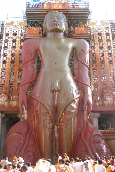 The huge statue of Bāhubali at Shravana Belgola is anointed with a succession of holy substances in the 2006 'great head-anointing ceremony’ – mahā-mastakābhiṣeka.