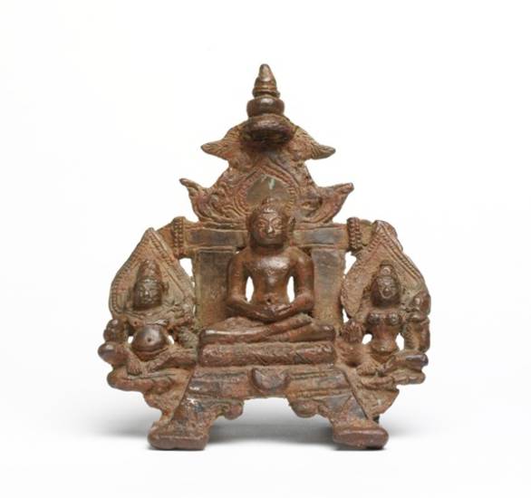Bronze image of Candraprabha and his attendant deities. The emblem of the eighth Jina, the crescent moon, is clearly visible below his throne. His yakṣa Vijaya or Śyāma and yakṣī Jvālāmālinī sit either side and each hold a lotus stem and bud.