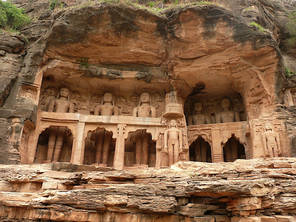 Huge statues at Gwalior in Madhya Pradesh of the 24 Jinas, whose teachings show the path to liberation from the cycle of birth. Cut into the rock face, the figures were carved in the 15th century and may have been designed to survive the end of the world
