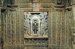 The plain appearance of the Jina figure contrasts with its ornately carved image-chamber in the Digambara temple at Lakkundi, Karnataka. The principal temple icon is within the image-chamber – garbha-gr̥ha, literally 'womb chamber' – the holiest area.