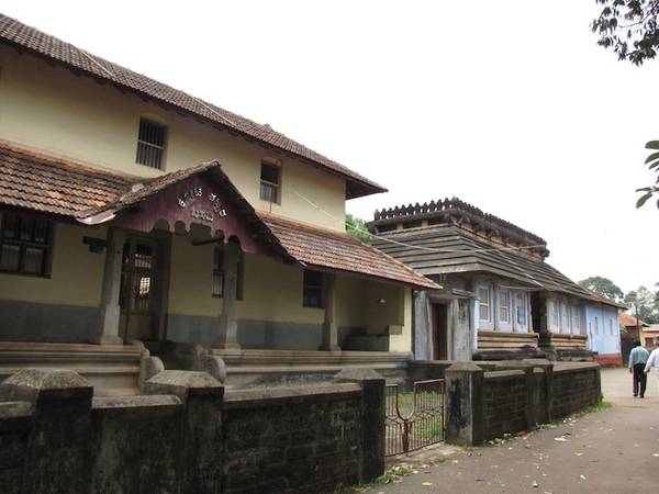 Gatehouses to Koti Basadi and Guru Basadi. There are nearly 20 temples within the village of Mudabidri, with several temple compounds along one of the main streets. A centre of Digambara Jainism for centuries, Mudabidri remains an important site.