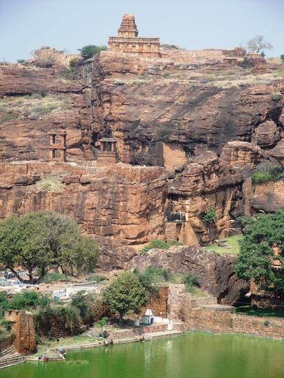 The four cave temples at Badami in northern Karnataka are very well known. Three of the sandstone caves are dedicated to Hindu gods while the fourth is Jain, with a figure of Mahāvīra in the sanctum. Images of Jinas, Bāhubali and deities are also inside.