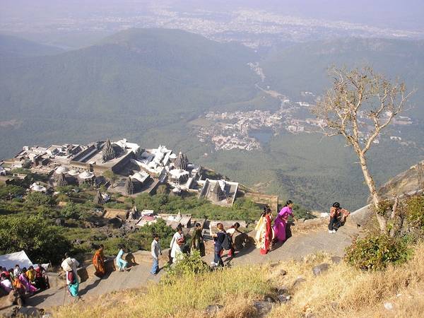 Pilgrims climb some of the thousands of steps at Mount Girnar. Overlooking the town of Junagadh, the Jain temples at this holy site are built on the five peaks of the mountain and attract thousands of pilgrims annually.