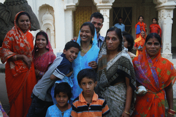 Members of an extended Jain family outside a temple at Dīvālī. Festivals are popular times to take vows, which may be temporary or longer-lasting. Common vows include undertaking fasts or other dietary restrictions, remaining chaste or studying scripture.