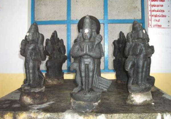 Figures of the Nava-grahas – 'Nine Planets' – in a shrine outside the main temple at Karandai, Tamil Nadu. The Nava-grahas are one of the classes of gods – the Jyotiṣkas – who live in the lower world of Jain cosmology.