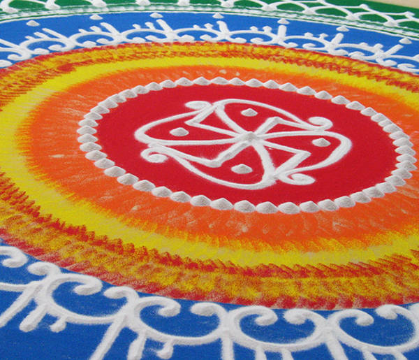 Rangoli – auspicious patterns and pictures – are common at Indian festivals and celebrations such as weddings. Rangoli symbolise welcome and auspiciousness and are usually arranged on floors, especially at the doors to houses and temples. Usually created