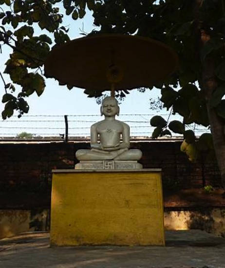 The seventh Jina Supārśvanātha with his emblem, the svastika. In this open space in Sarnath, Uttar Pradesh, images of the four Jinas associated with Sarnath and the neighbouring town of Varanasi have been carved: Śreyāṃsa, Candraprabha and Pārśva.
