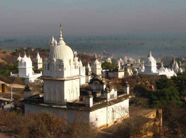 The 77 temples and shrines at Sona-giri comprise a popular pilgrimage site for Digambara Jains. Sona-giri means 'golden hill' in Hindi and the main temple is dedicated to Candraprabha-svāmī or Lord Candraprabha, the eighth Jina.